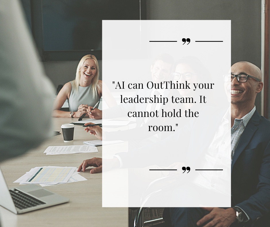 Senior leaders, men and women, in conversation around a boardroom table